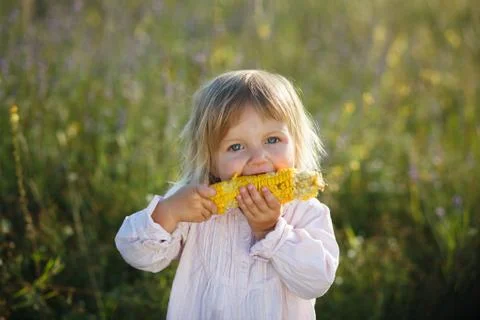 Child, corn Stock Photos