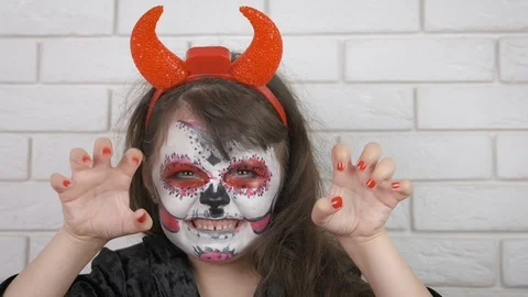 A child in the costume of the devil for Halloween. Stock Footage 111274498