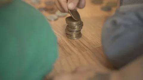 Child counts money Stock Footage 129691605