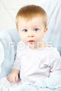 Child in cradle Stock Photos