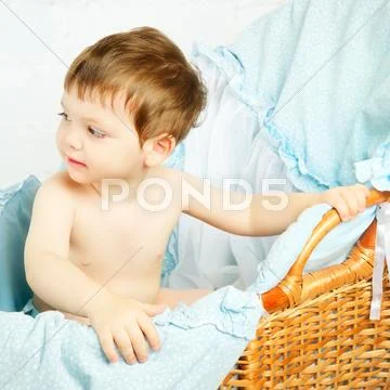Child in cradle Stock Photos