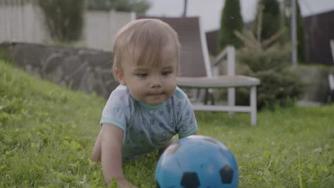 Child Crawling and Playing on Backyard Outdoor Stock Footage 161219696