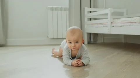 Child crawling towards the camera Stock Footage 143351845