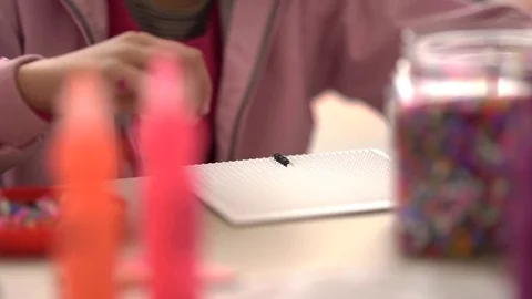 Child createing jewel Stock Footage