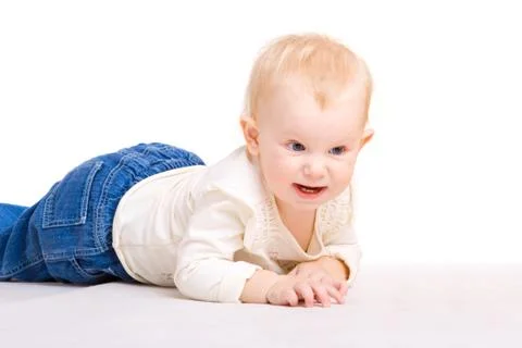Child creeps on a floor Stock Photos