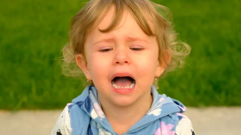 Child crying in the park. Selective focus. Stock Footage 256921977