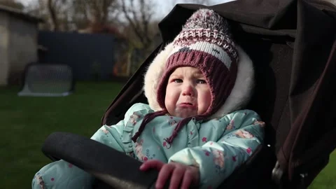 Child crying in the pram Stock Footage 143712861