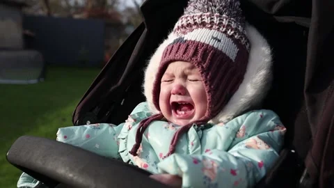 Child crying in the pram Stock Footage