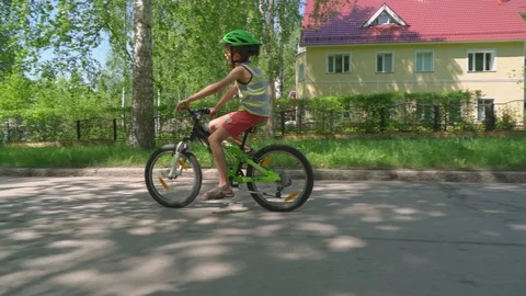 Child Cycling. Stock Footage 93600408