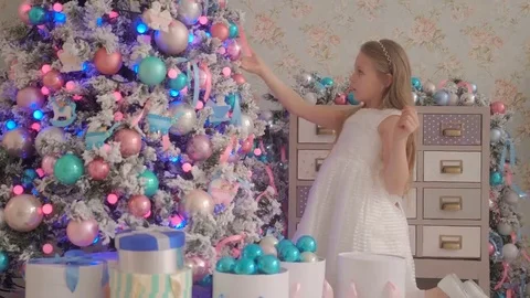 Child Decorating the Christmas Tree Stock Footage 69134678