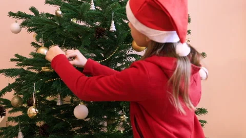 Child decorating Christmas Tree Stock Footage 160756333