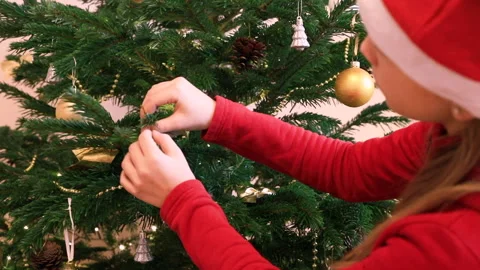 Child decorating Christmas Tree Stock Footage 160756342