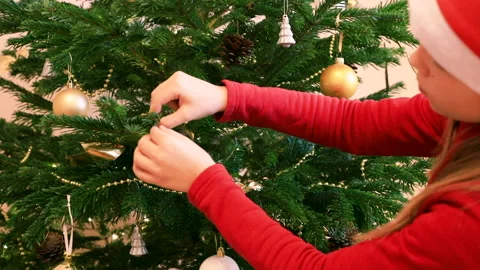 Child decorating Christmas Tree Stock Footage 161181068