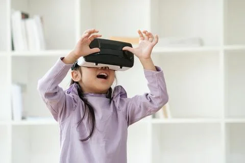 Child Delighted by Virtual Reality Experience Fotos de archivo