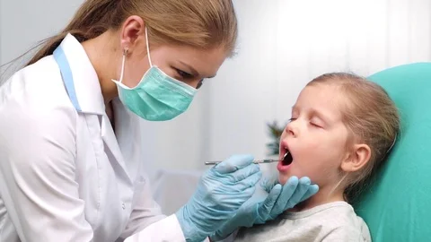 Child in dentist office Stock Footage 71784986