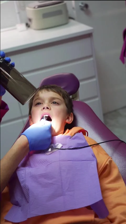 Child at the dentist's office. Vertical video Stock Footage 265568364