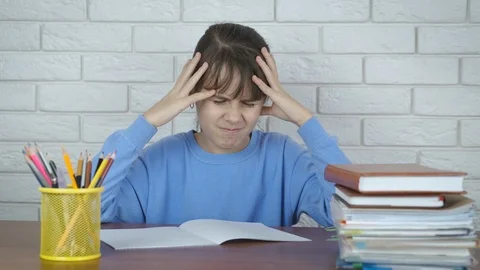 Child depressed because of homework. Stock Footage 106029809