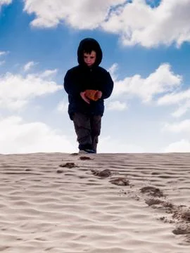 Child at desert Stock Photos