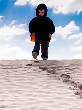 Child at desert Stock Photos