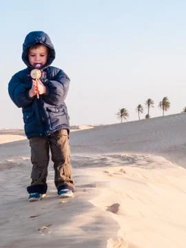 Child at desert Stock Photos