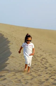 Child in desert Stock Photos