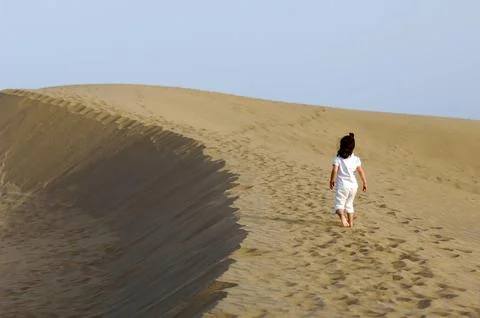 Child in the desert Stock Photos
