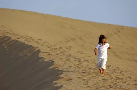 Child in desert Stock Photos