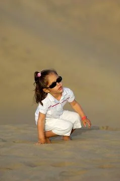 Child in desert Stock Photos