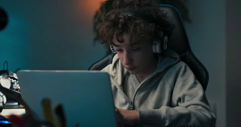 A child designs a building for tech class, does homework, draws with a pencil in Stock Footage 201228623