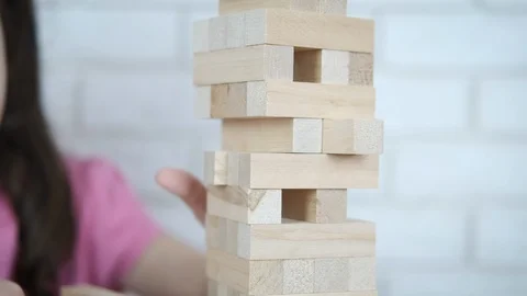 A child with a developing game. Video stock 105790229