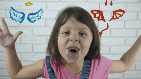Child devil. Kid vampire. Problem of choice. Stock Footage 100893357