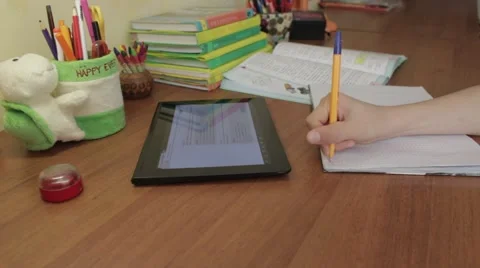 Child with digital tablet, to do homework at home. Stock-Footage 49934270