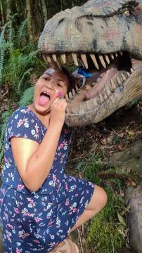 Child is the dinosaur Stock Photos