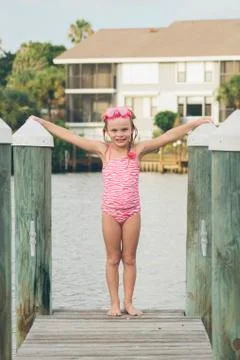 Child on Dock Stock Photos