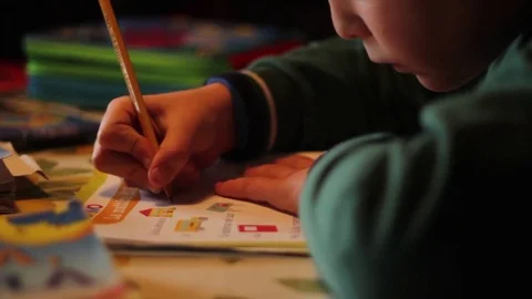 Child does the homework Stock Footage 74901439