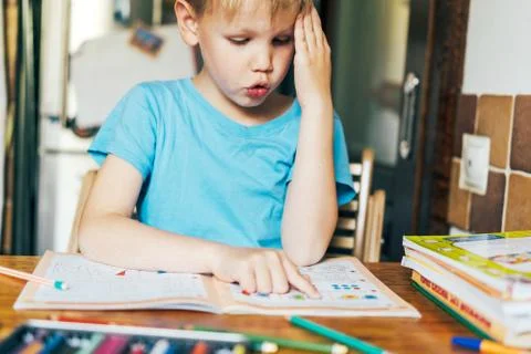 Child does homework Stock Photos
