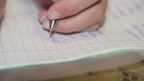 The child does lessons in Russian close-up Stock Footage 128497417