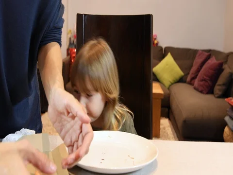 Child does not like pizza but plays with it Stock Footage 71399740