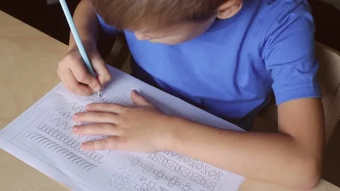Child doing his homework. View from above Stock Footage 144126939