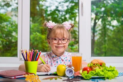 Child doing homework. Copy Space. Stock Photos