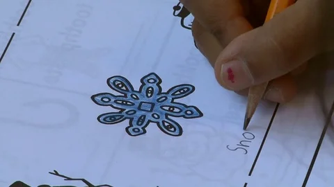 A child doing a Montessori writing exercise  in a Montessori School Class  Video stock 83225490