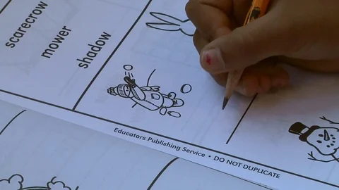 A child doing a Montessori writing exercise  in a Montessori School Class  Stock Footage 83225533