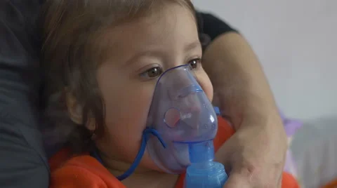 Child Doing Nebulizer Teraphy Stock Footage 61858325