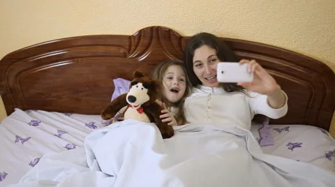 With a child doing selfie mom Stock Footage 60397999