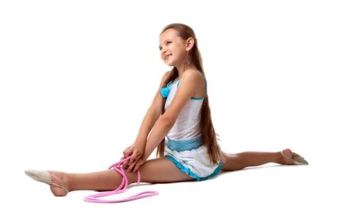 Child doing split with skipping rope isolated Stock Photos