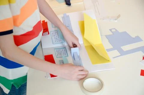Child doing their school project Stock Photos