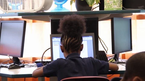Child doing work on computer Stock Footage 92495389