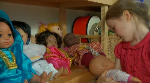 Child with doll Stock Footage 22637047