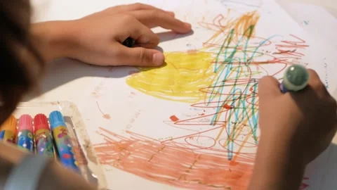 Child doodling on the paper Video stock 263140001