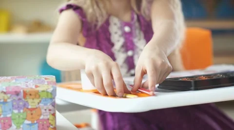 A child of the drawing. 7-9 years girl draws with crayons Video stock 67877235